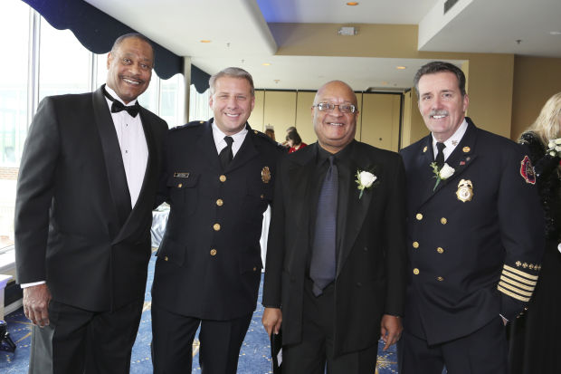 Donn Johnson, St. Louis Police Chief Sam Dotson, Rev. Earl Nance, St. Louis Fire Chief Dennis Jenkerson
